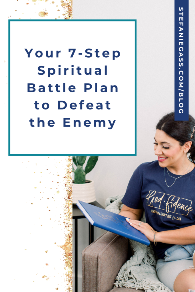 gold splatter and background image of dark-haired woman sitting on couch looking at notebook with title Your 7-Step Spiritual Battle Plan to Defeat the Enemy. stefaniegass.com/blog
