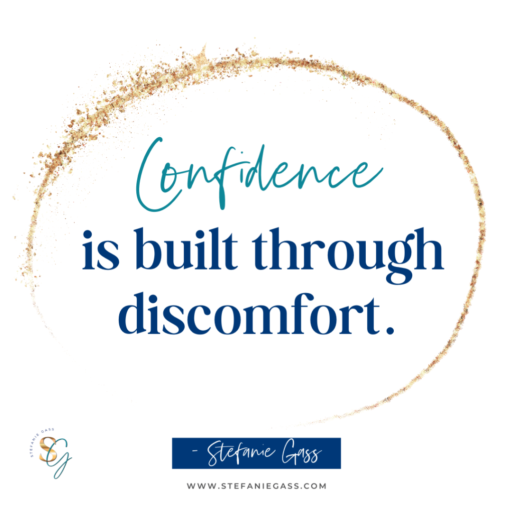 Gold splatter background with quote Confidence is built through discomfort. -Stefanie Gass