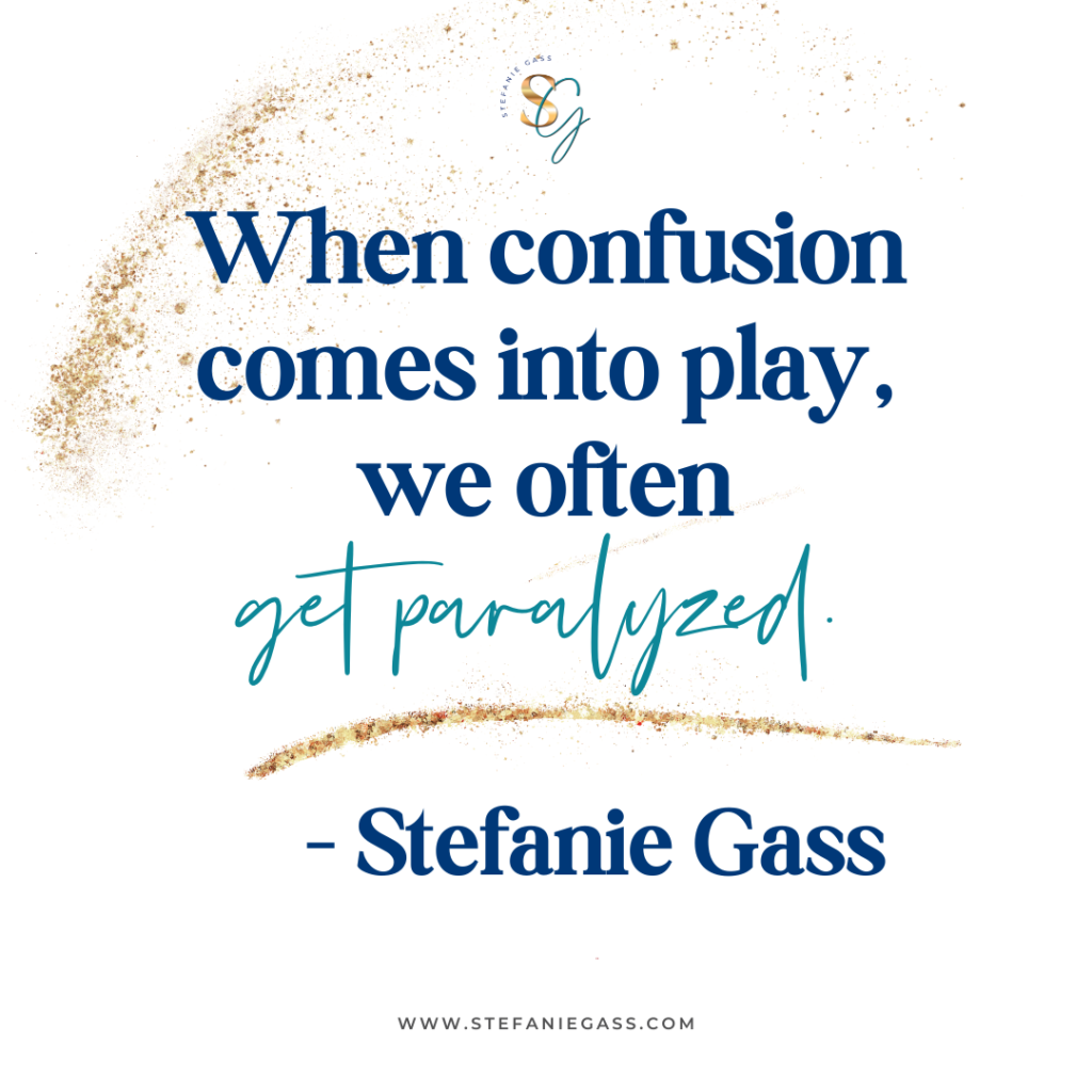 Gold splatter background and quote When confusion comes into play we often get paralyzed. -Stefanie Gass