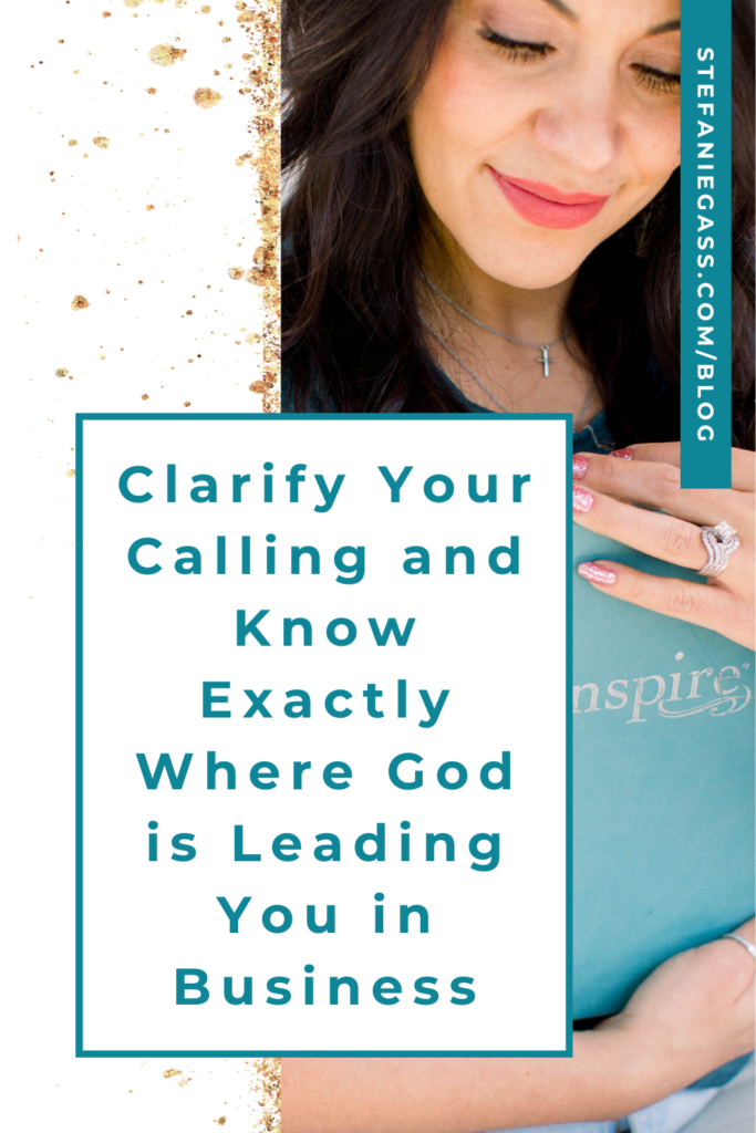 Gold splatter background and image of dark-haired woman holding Bible and title Clarify your calling and know exactly where God is leading your in business. stefaniegass.com/blog