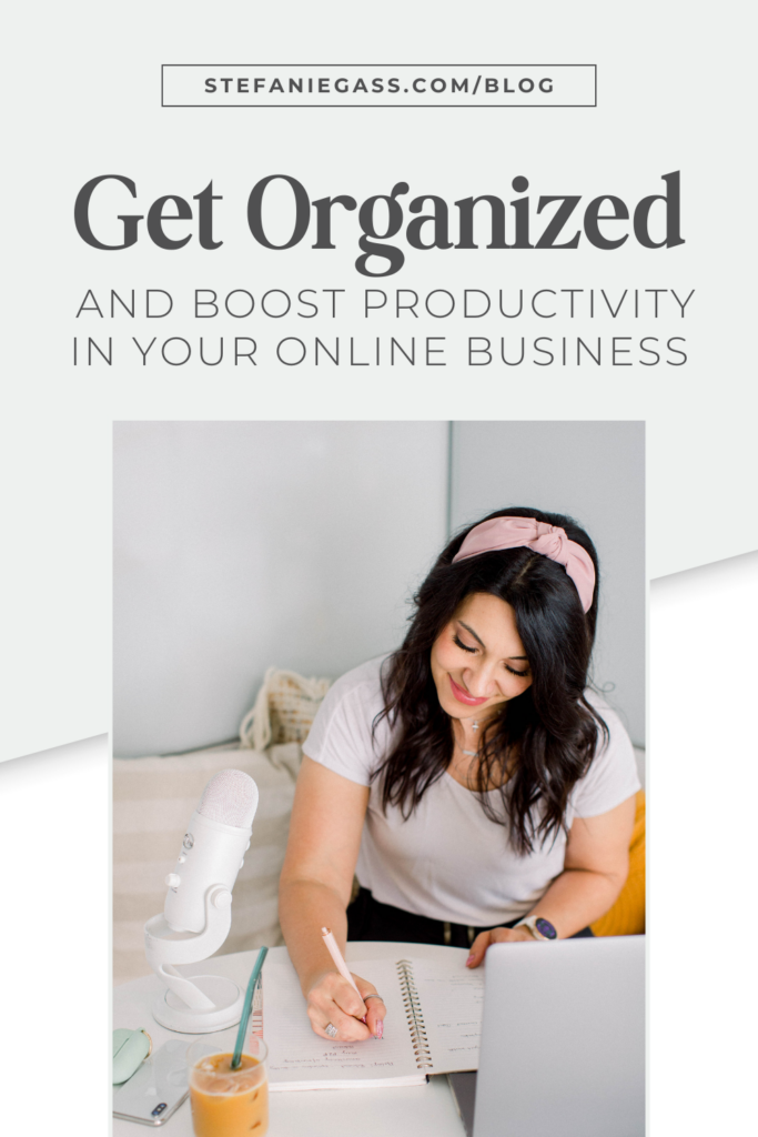 image of a dark haired woman writing in her notebook at her desk. Text reads: Get organized and boost productivity in your online business.