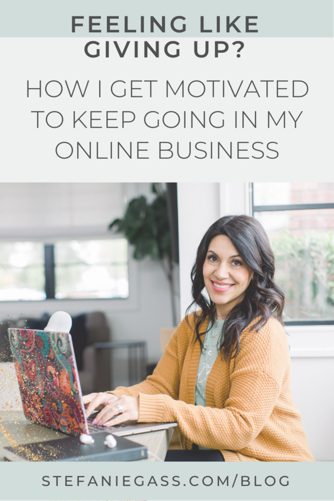 Dark haired woman working at her desk with her laptop. Feeling like giving up? How I get motivated to keep going in my online business. Link reads stefaniegass.com/blog