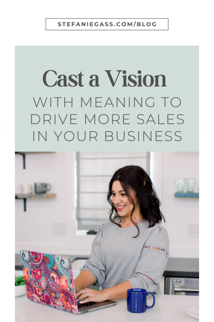 photo of a dark haired woman sitting in her kitchen with a laptop and cup of coffee and text above reading cast a vision with meaning to drive more sales in your business.