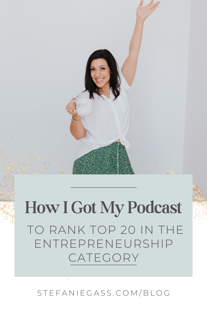 dark haired woman with her left arm waving above her head. She has a white coffee mug in her right hand and she's wearing a white blouse with a long green skirt. She looks like she is celebrating. Title is, "How I Got My Podcast to Rank Top 20 in the Entrepreneurship Category." Link at the bottom is stefaniegass.com/blog