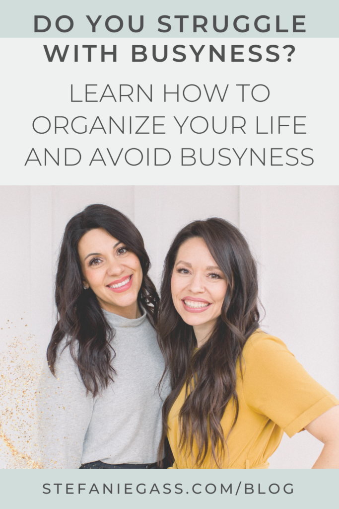 Light blue background with a light green strip at the top and bottom. Image shows 2 dark-haired women standing side by side. The first woman is wearing a light blue top with dark blue pants and the other woman is wearing a yellow dress. Title is “do you struggle with busyness? learn how to organize your life and avoid busyness” The link mentioned at the bottom reads stefaniegass.com/blog.