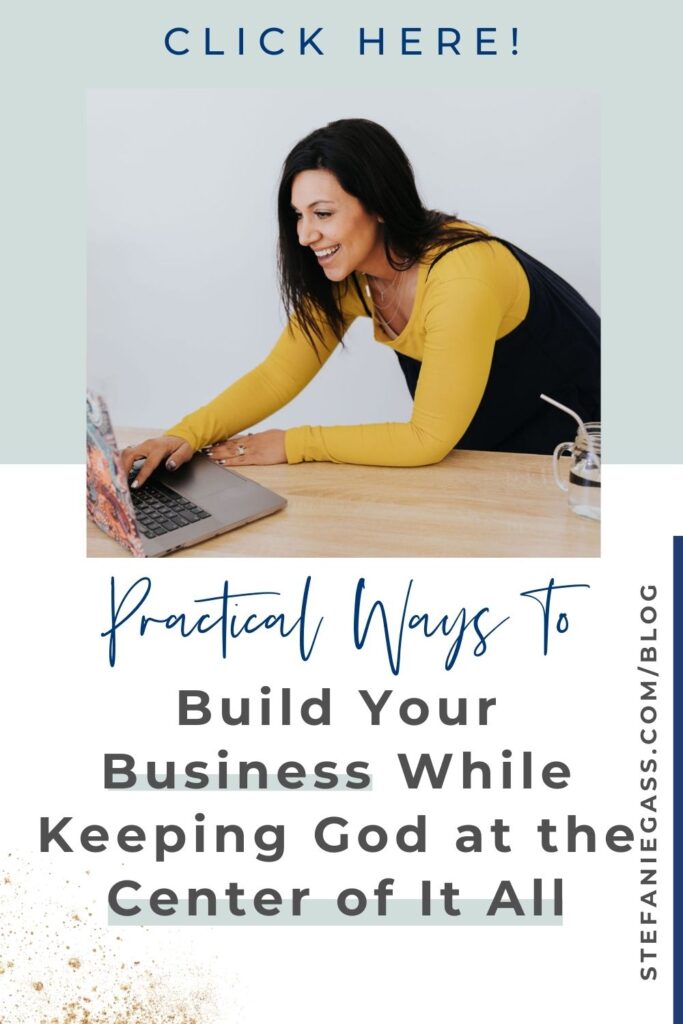 On a grey and white blocked background, the foreground is a photo of a dark haired lady leaning onto a desk with her left arm and working on a computer with her right hand. Text reads Practical ways to build your business while keeping God at the center. The link mentioned is stefaniegass.com/blog