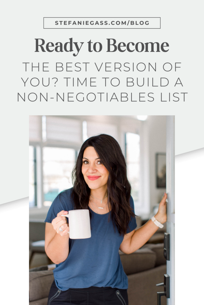 Light blue background with dark-haired woman standing in a doorway and wearing a dark blue shirt, holding a cup of coffee. The link at the top is stefaniegass.com/blog. Title is “Ready to Become the Best Version of You? Time to Build a Non-negotiables List”