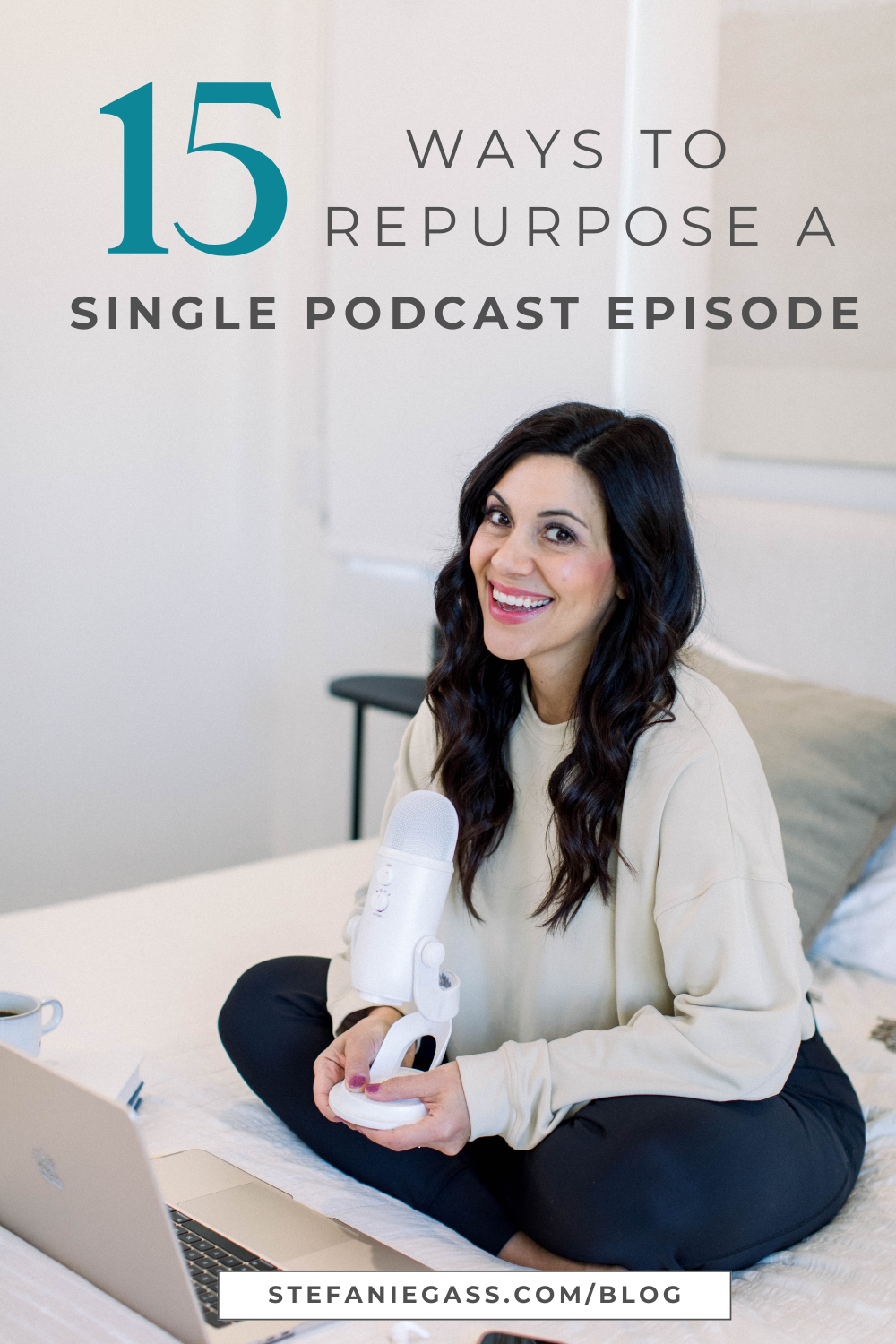 a brown haired woman smiling as she works at her laptop holding a white podcast microphone in her hand  Text reads:  15 Ways to Repurpose a Single Podcast Episode