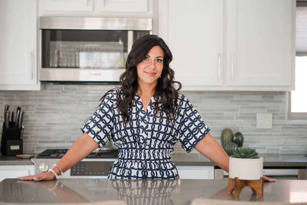 in-kitchen-at-counter-calm-happy-smile-stefanie-gass-horizontal The blog post and podcast title is: Ep-825-80-Percent-Conversion-Rate-and-21K-in-Sales-How-Lara-Frendjian-Did-It-In-Just-Six-Months-Stefanie-Gass